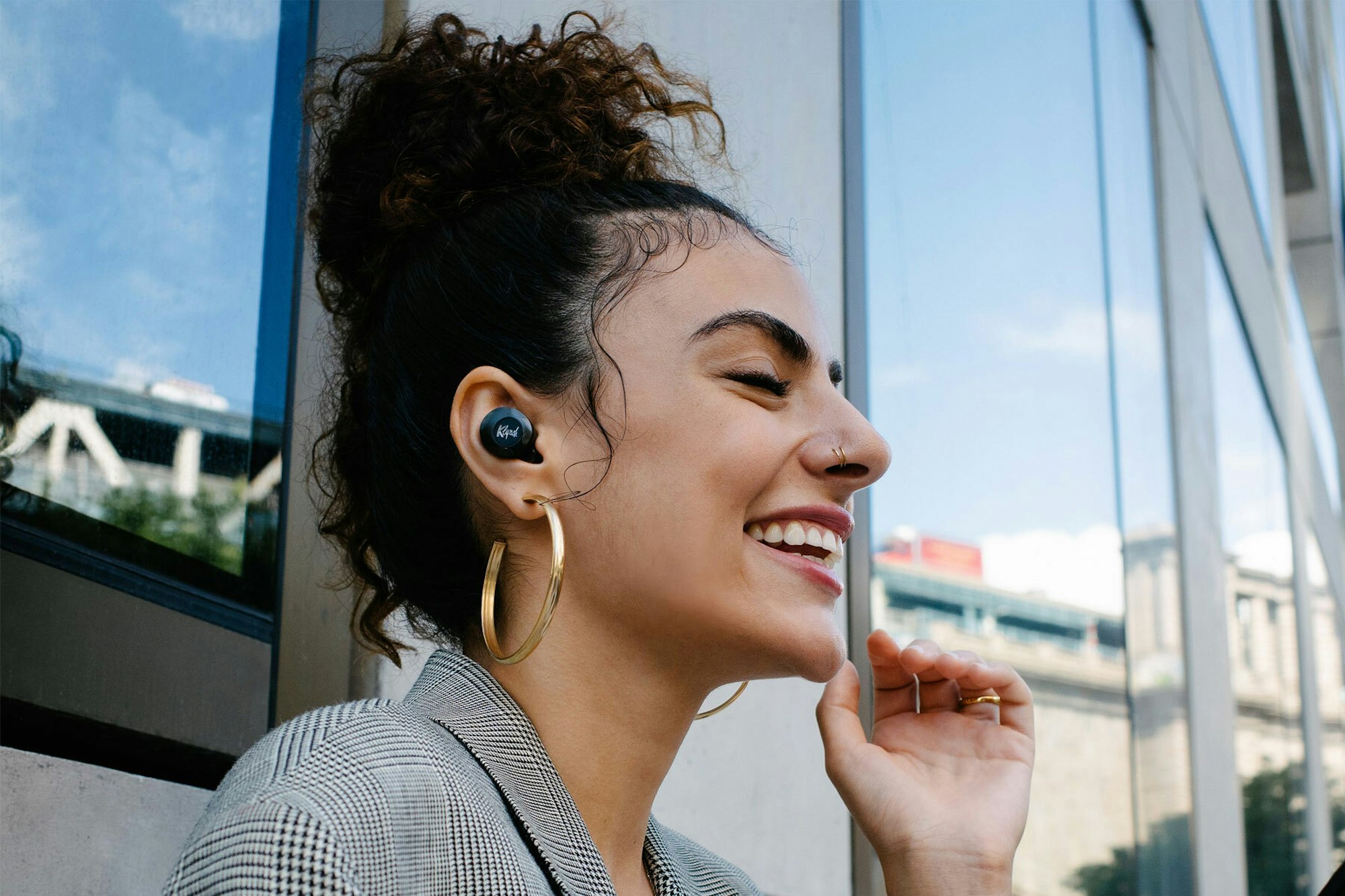 Klipsch T5 ANC woman wearing ANC earbuds