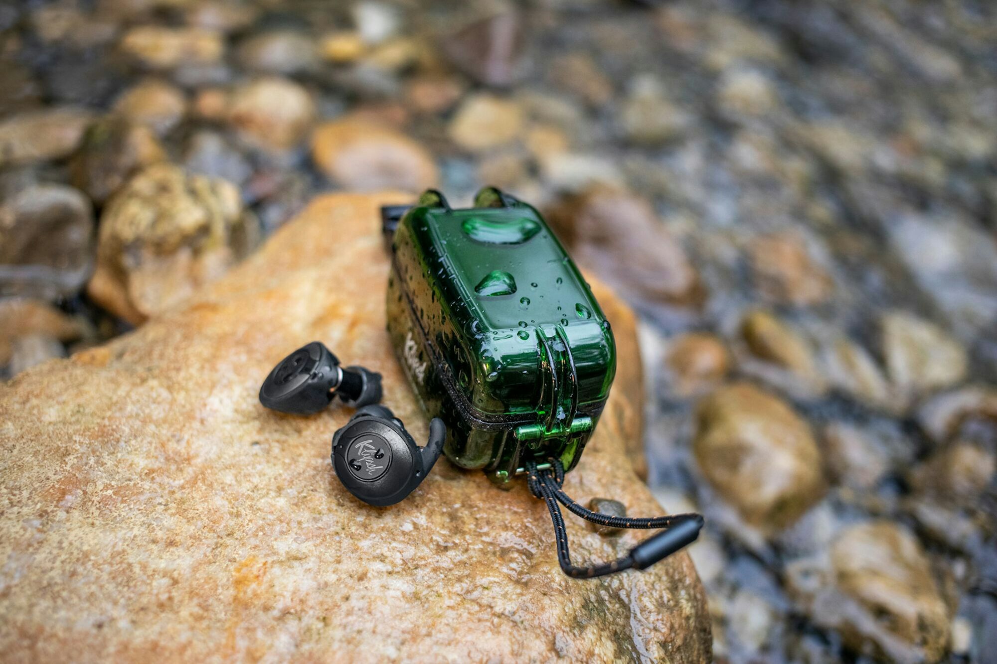 Klipsch T5 II Sport on wet rock waterproof earbuds
