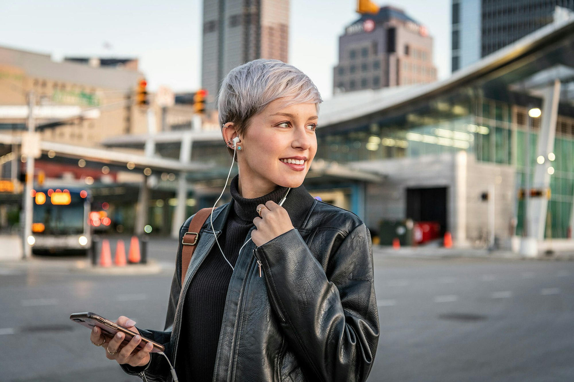 Klipsch wired headphones woman in a city music consumption