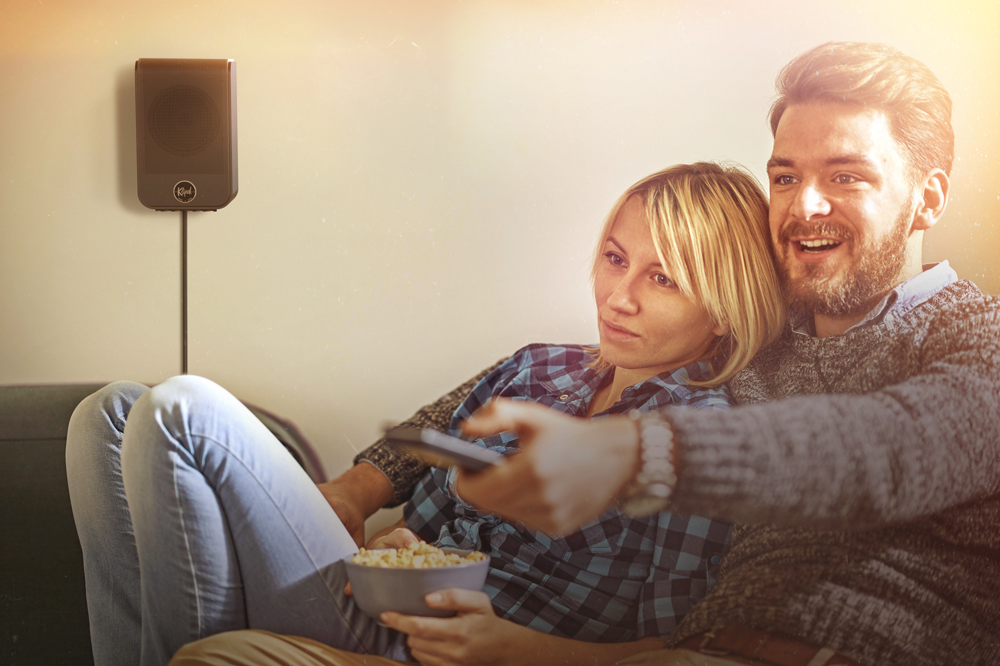 Flexus SURR 100 on Wall Behind Movie Watchers brighter 2000x1333