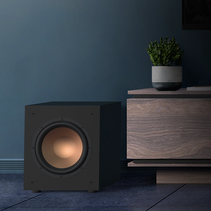 KD 10 SW on a floor next to a wooden credenza mobile