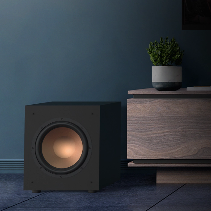 KD 10 SW on a floor next to a wooden credenza mobile
