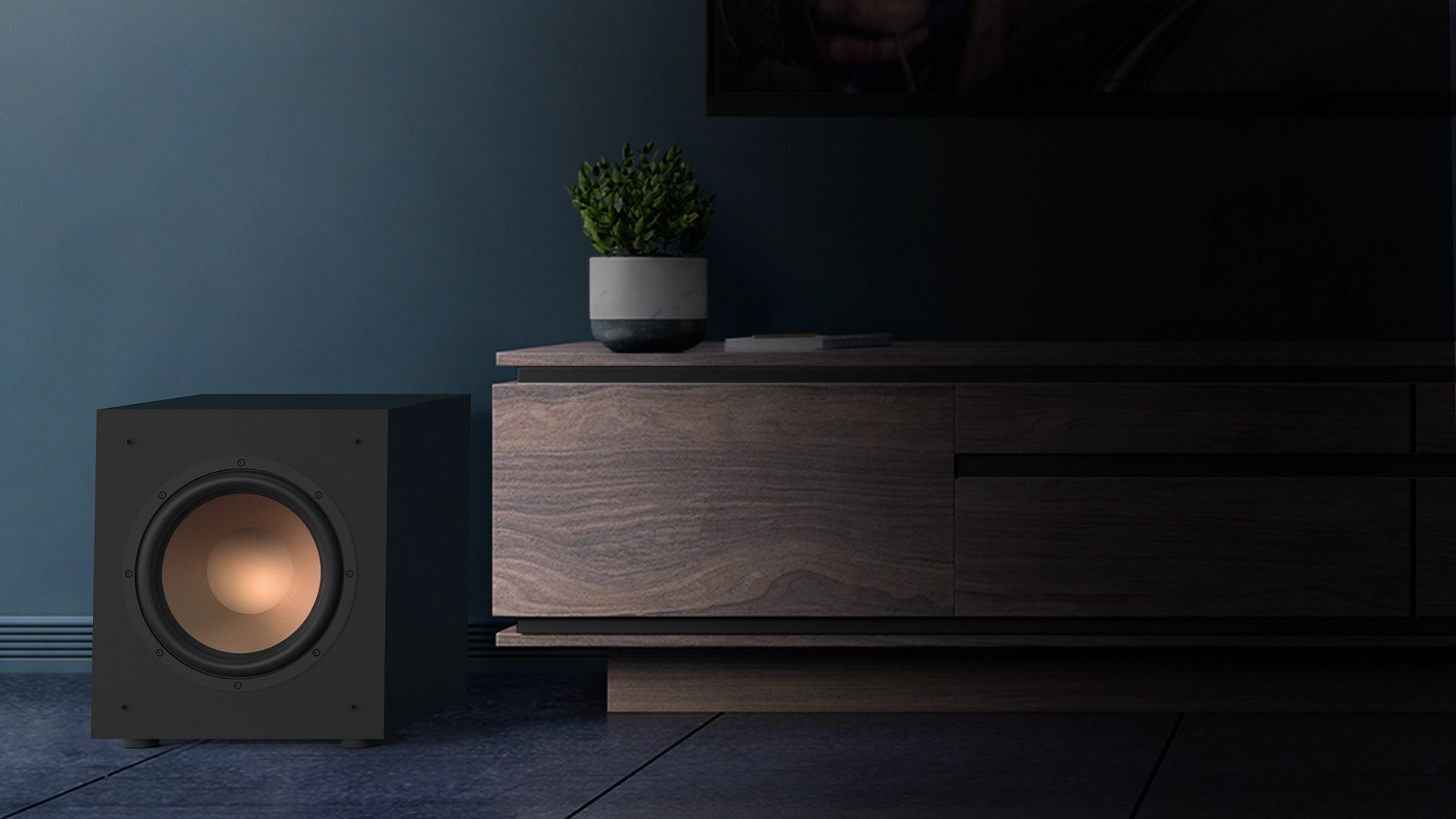KD 10 SW on a floor next to a wooden credenza