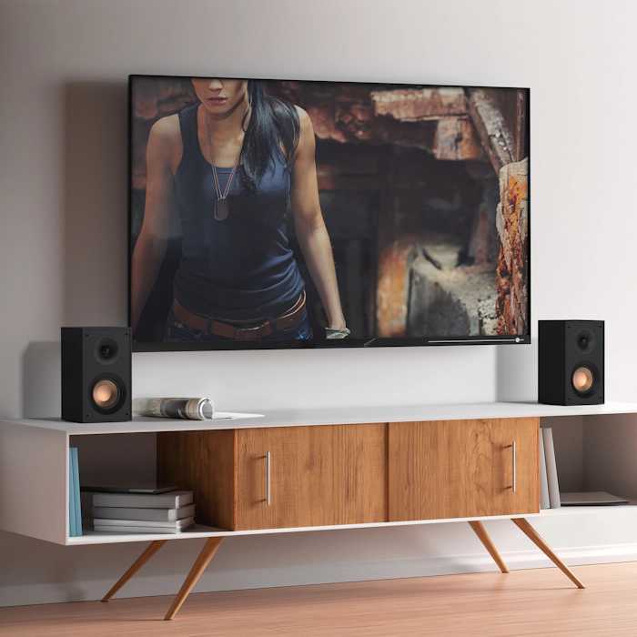 KD 400 on a white and wood credenza under a wall mounted tv mobile