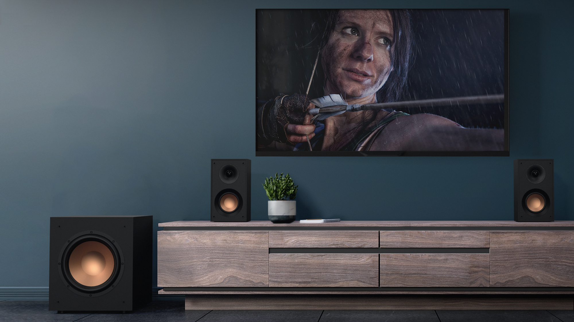 KD 400 on a wooden credenza next to a KD 10 SW subwoofer under a wall mounted TV