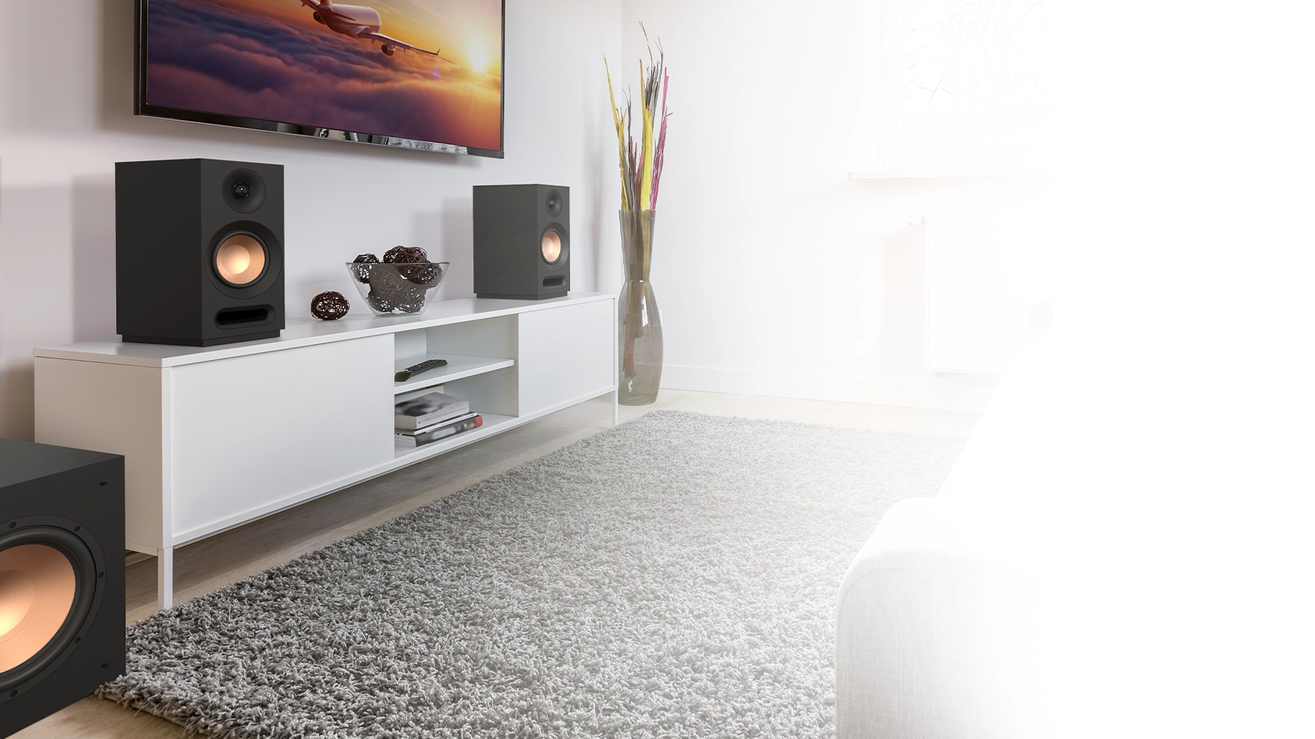 KD Series Bookshelf system in a living room setting with white furniture