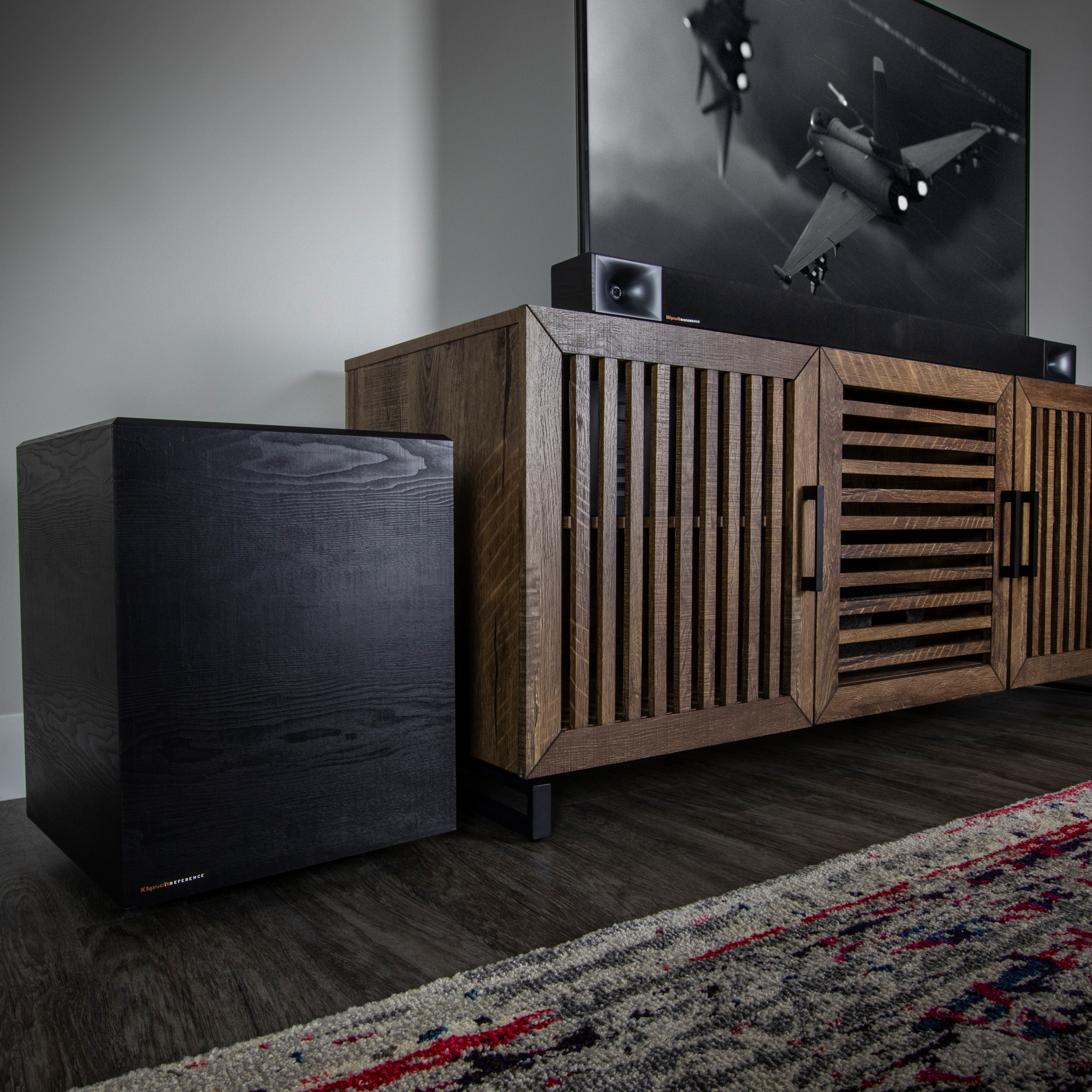 Klipsch Cinema 600 with wireless subwoofer on an entertainment center mobile