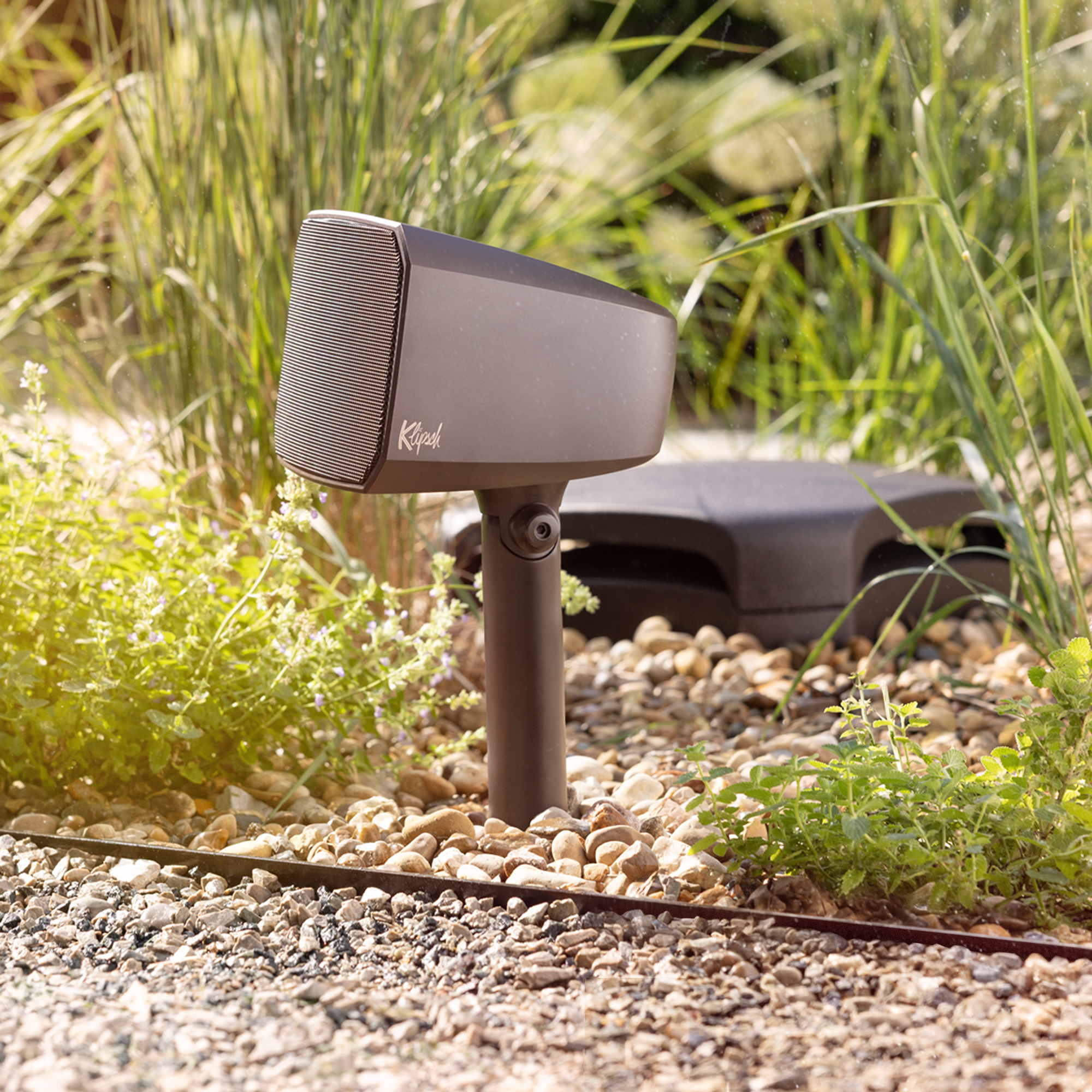 Klipsch Courtyard Satellite speaker and sub in sunshine Animation A 2000x2000