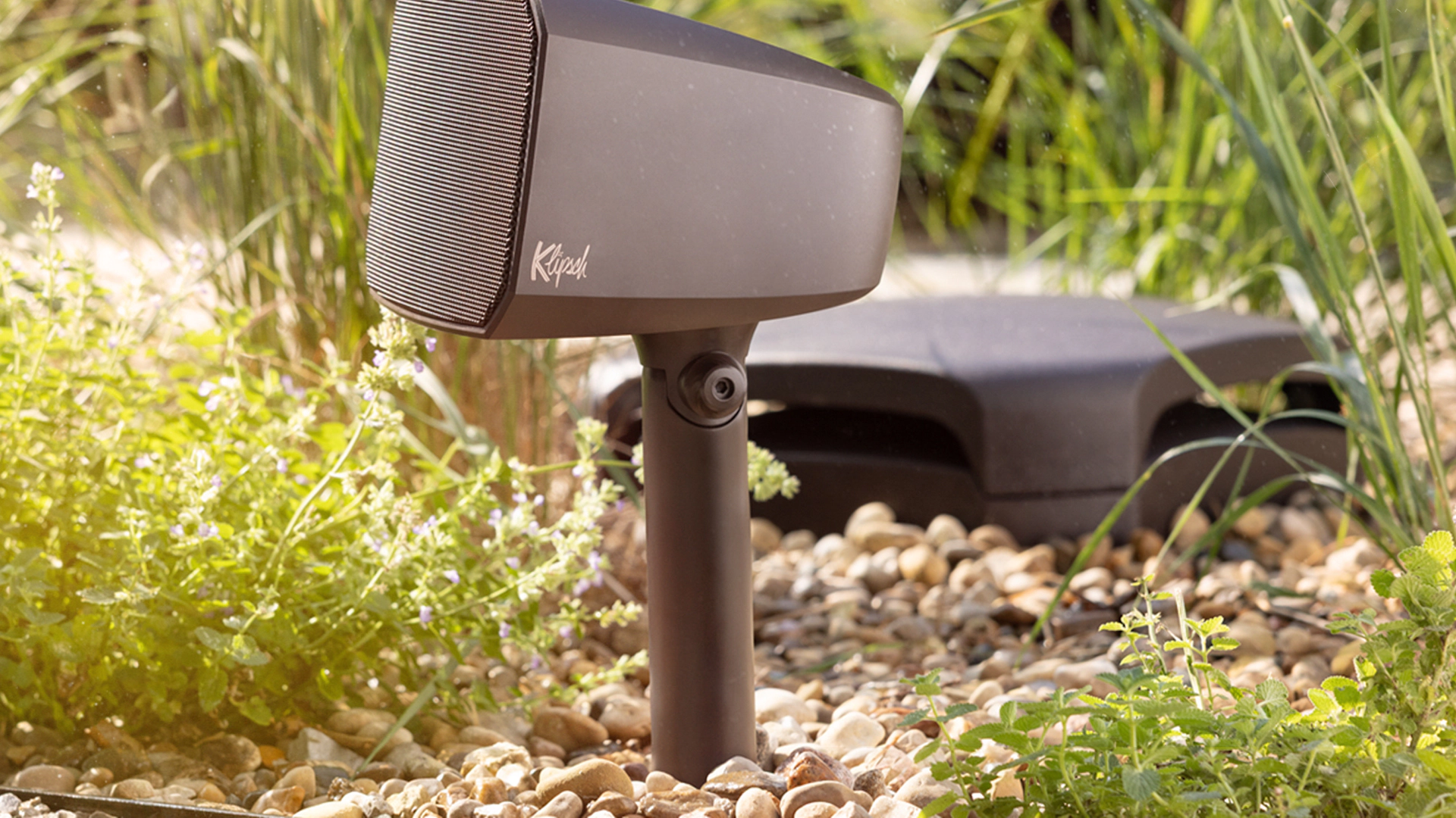 Klipsch Courtyard Satellite speaker and sub in sunshine Animation A 2000x2000