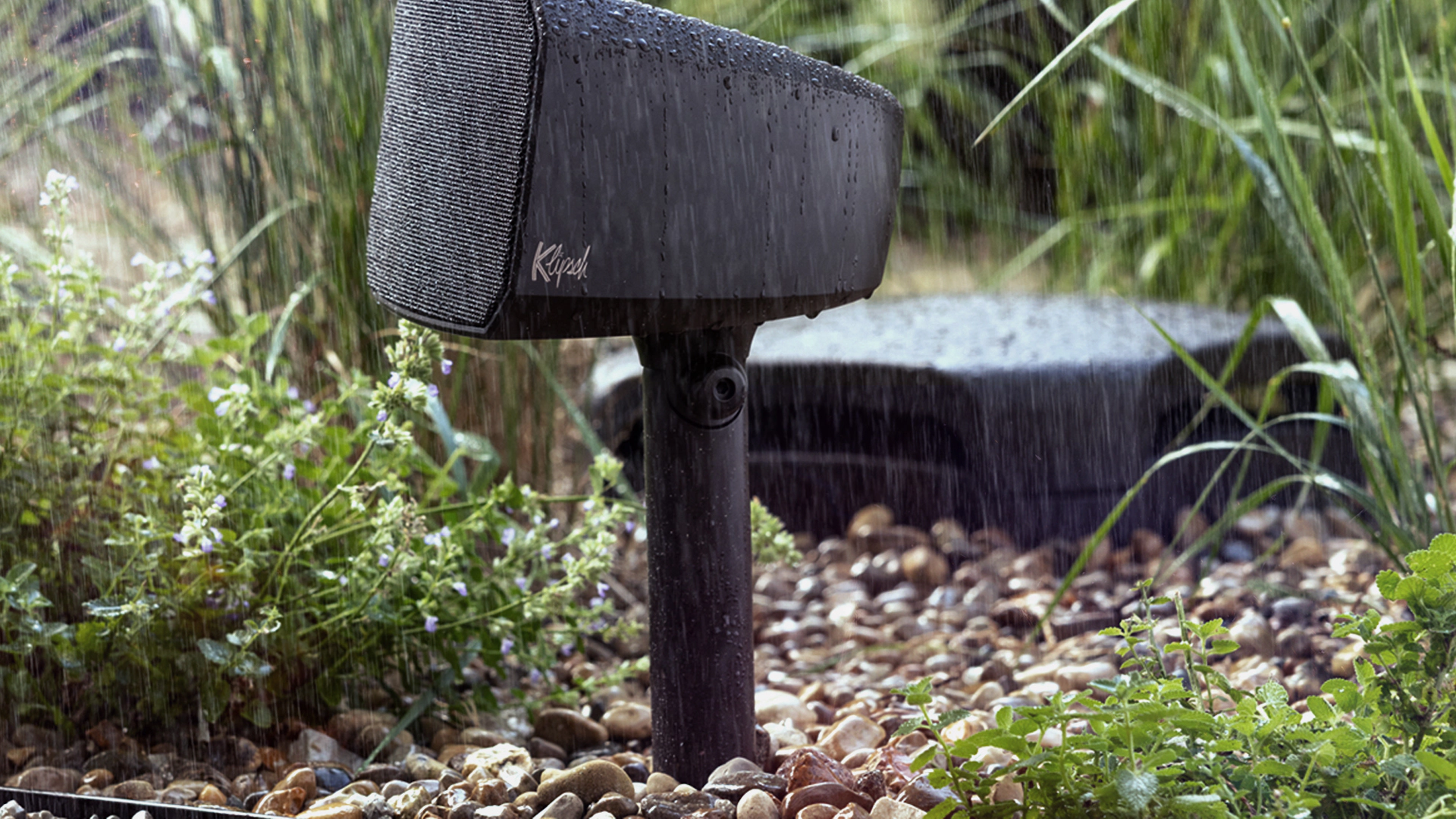 Klipsch Courtyard Satellite speaker and sub in sunshine Animation B 2000x2000