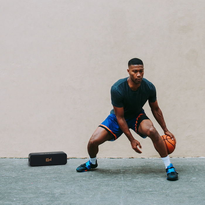 Klipsch Detroit on basketball court beside athlete 2000x2000