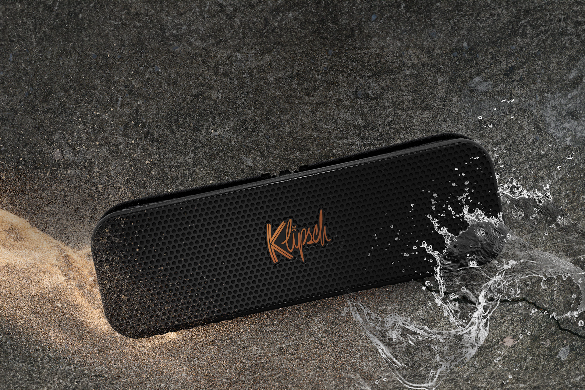 Klipsch Detroit on rough background with sand and water 2000x1333