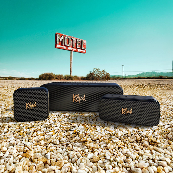 Klipsch Music City Series on road with motel in the background and bright blue sky v01 2000x2000