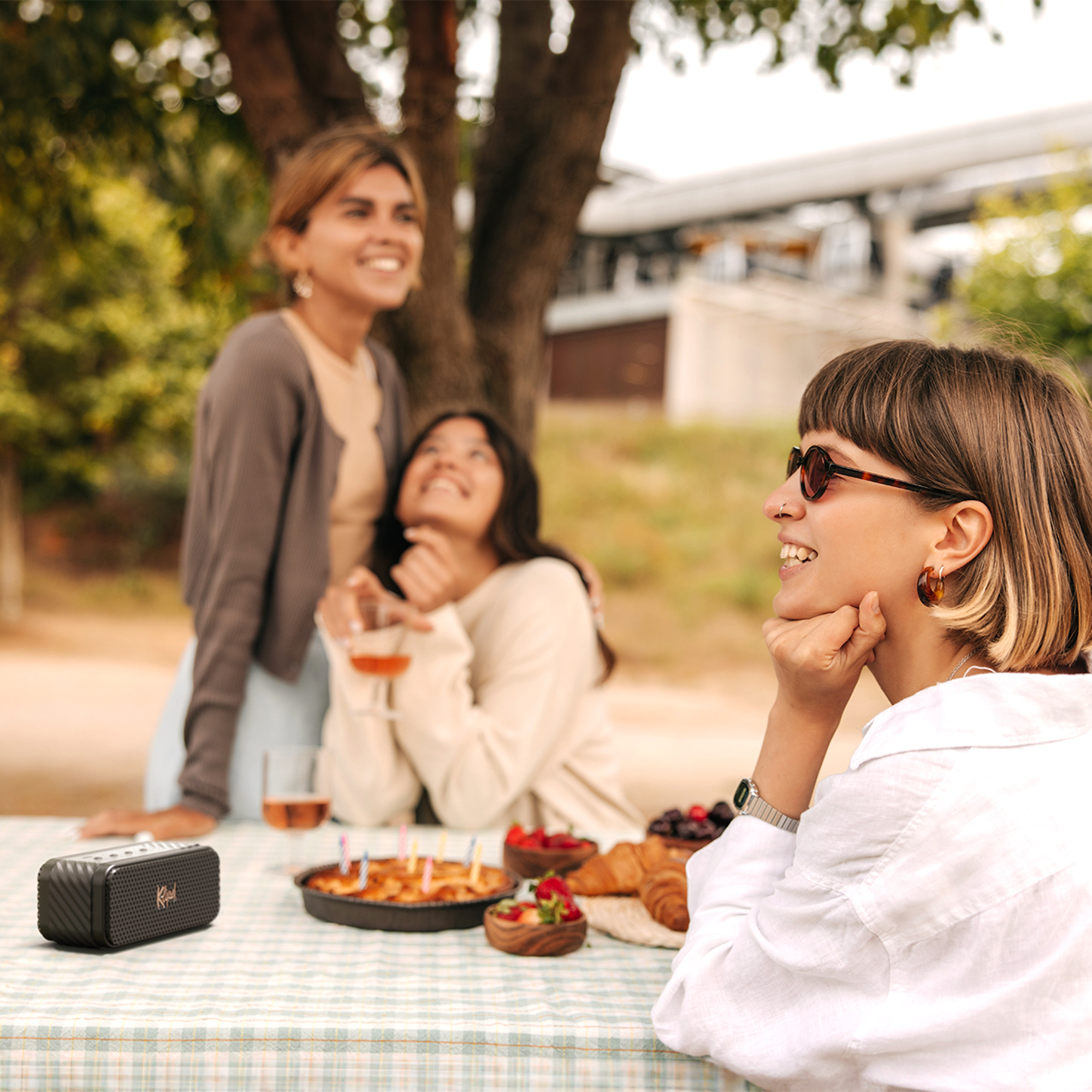 Klipsch Nashville on Picnic Table with friends 2000x2000
