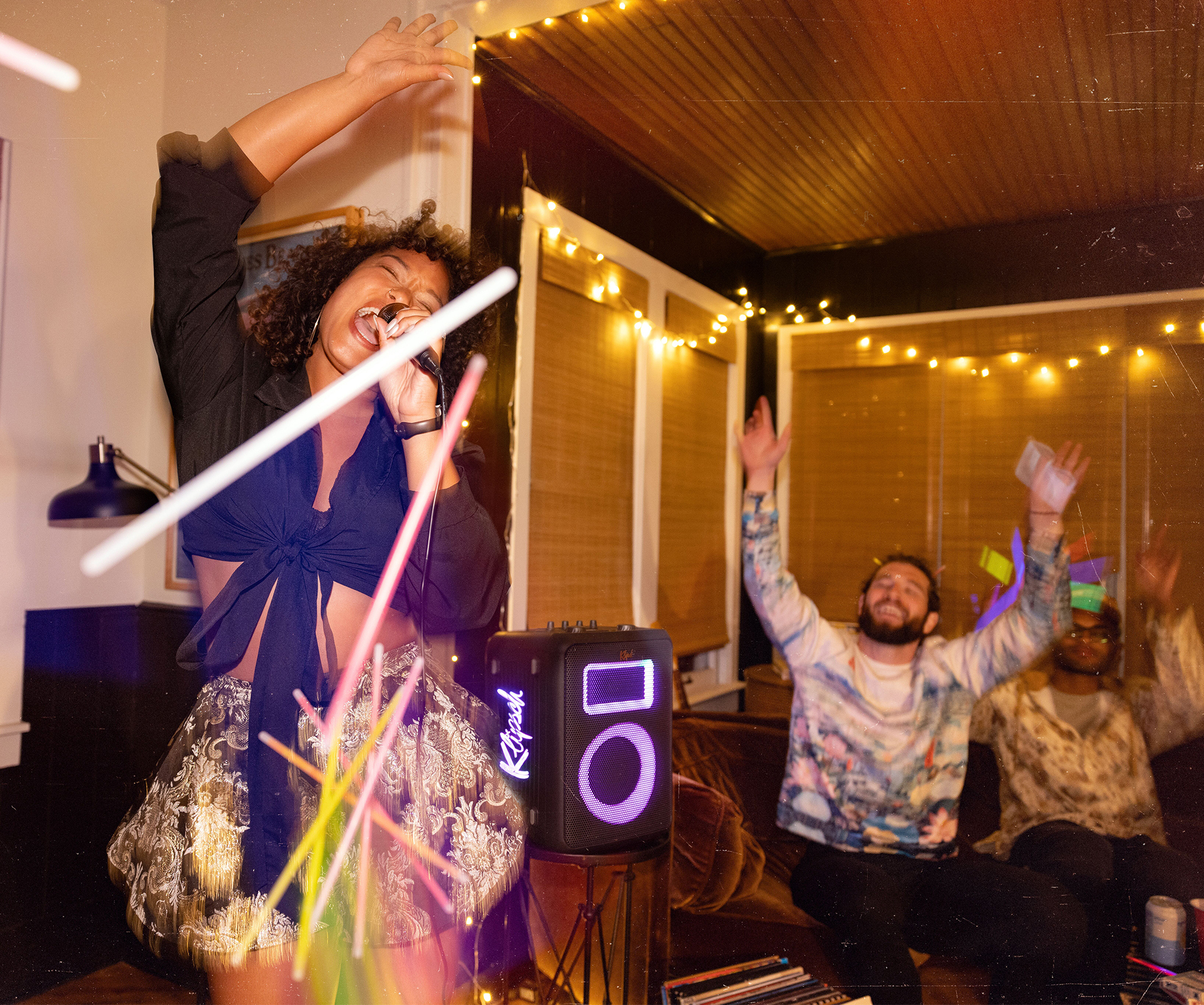 Klipsch Party Speakers Vibe karaoke superstar belting out her jam 2000x1670