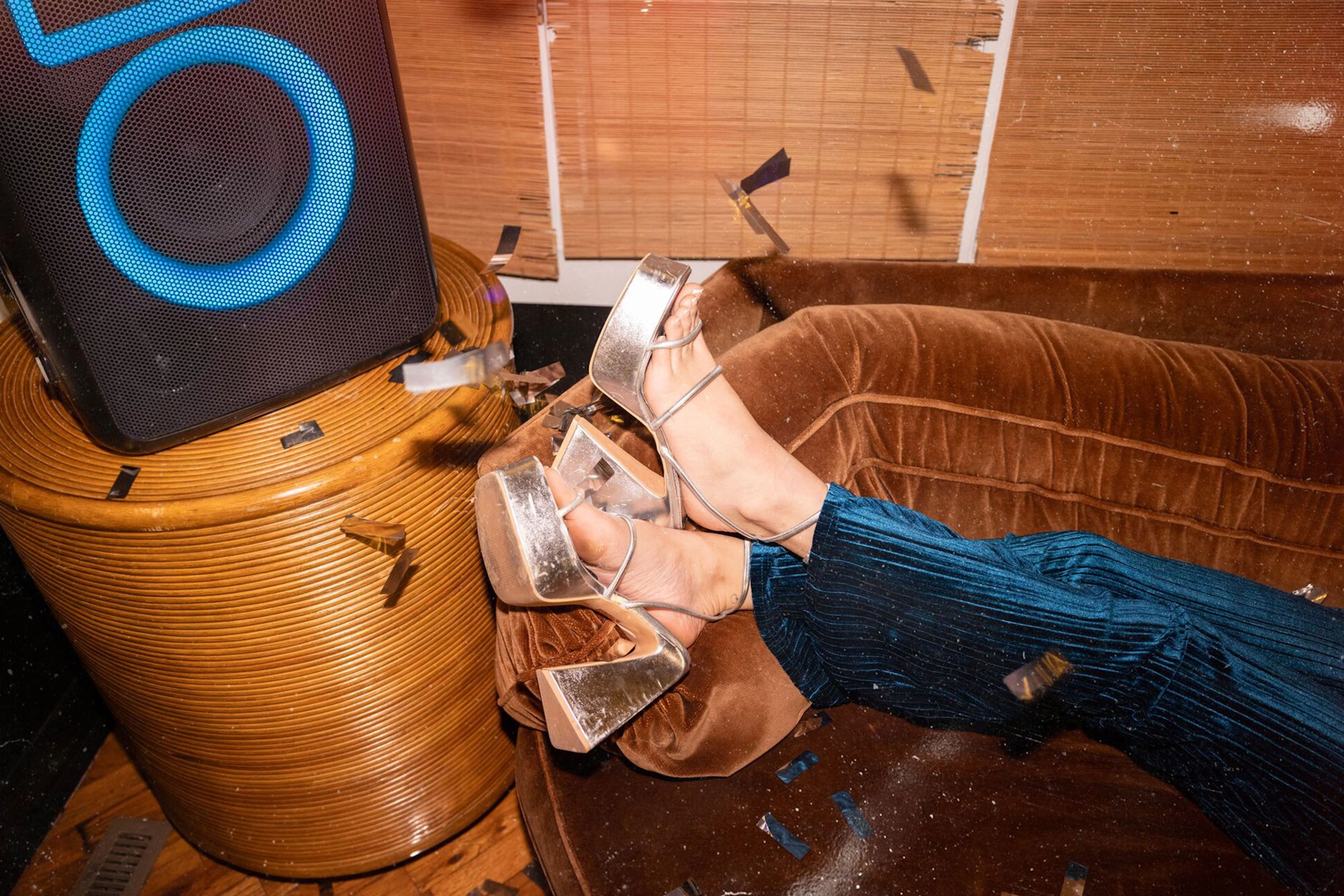 Klipsch Party Speakers Vibe speaker and party shoes on couch 2000x1333