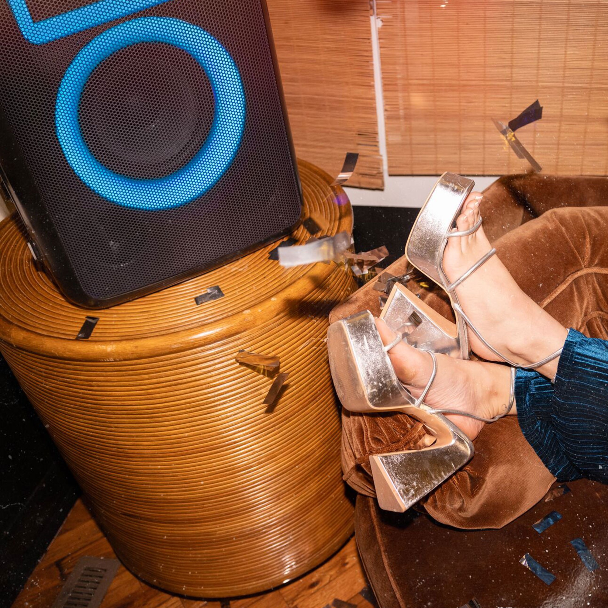 Klipsch Party Speakers Vibe speaker and party shoes on couch 2000x2000