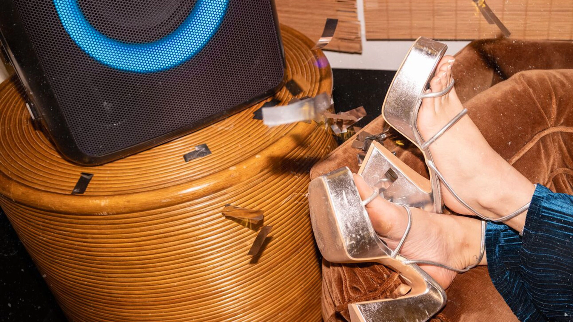 Klipsch Party Speakers Vibe speaker and party shoes on couch 2000x2000