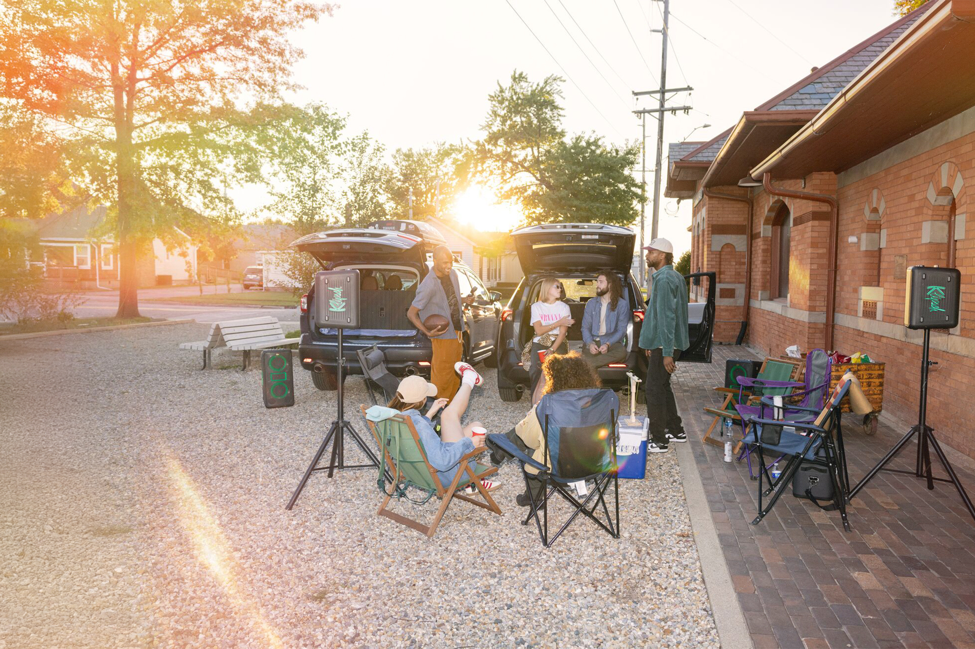 Klipsch Party Speakers Vibe tailgate party with setting sun 2000x1333