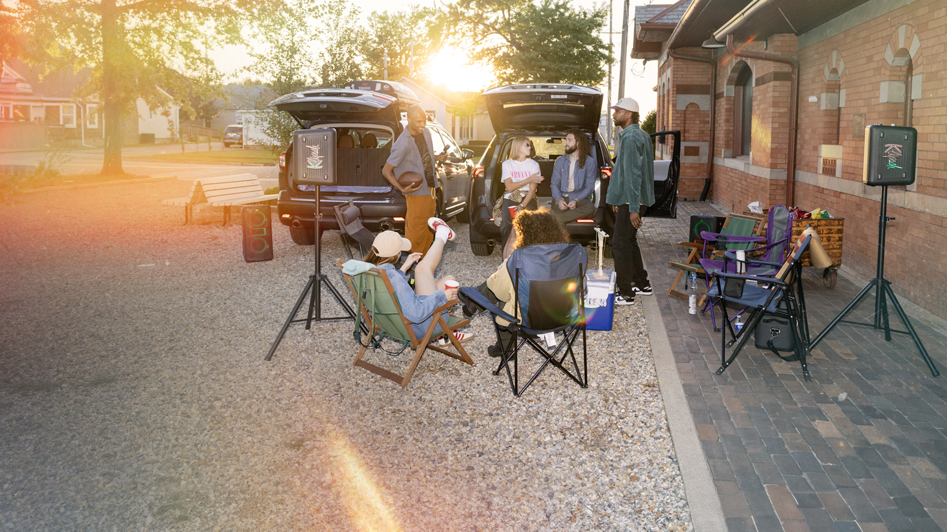 Klipsch Party Speakers Vibe tailgate party with setting sun 2000x1333