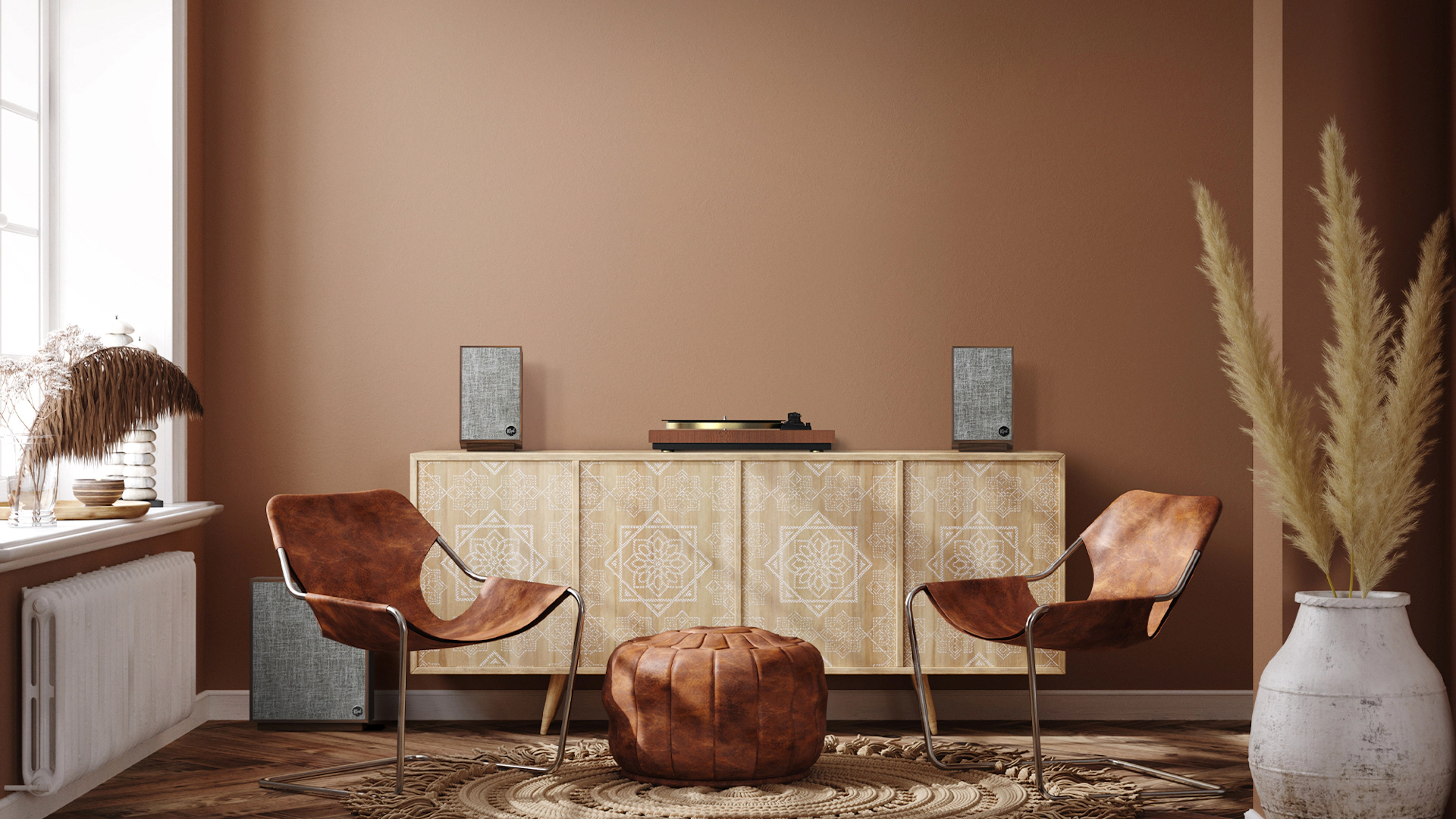 Klipsch Pro Media Heritage 2 1 speakers in a home next to a record player with 2 chairs