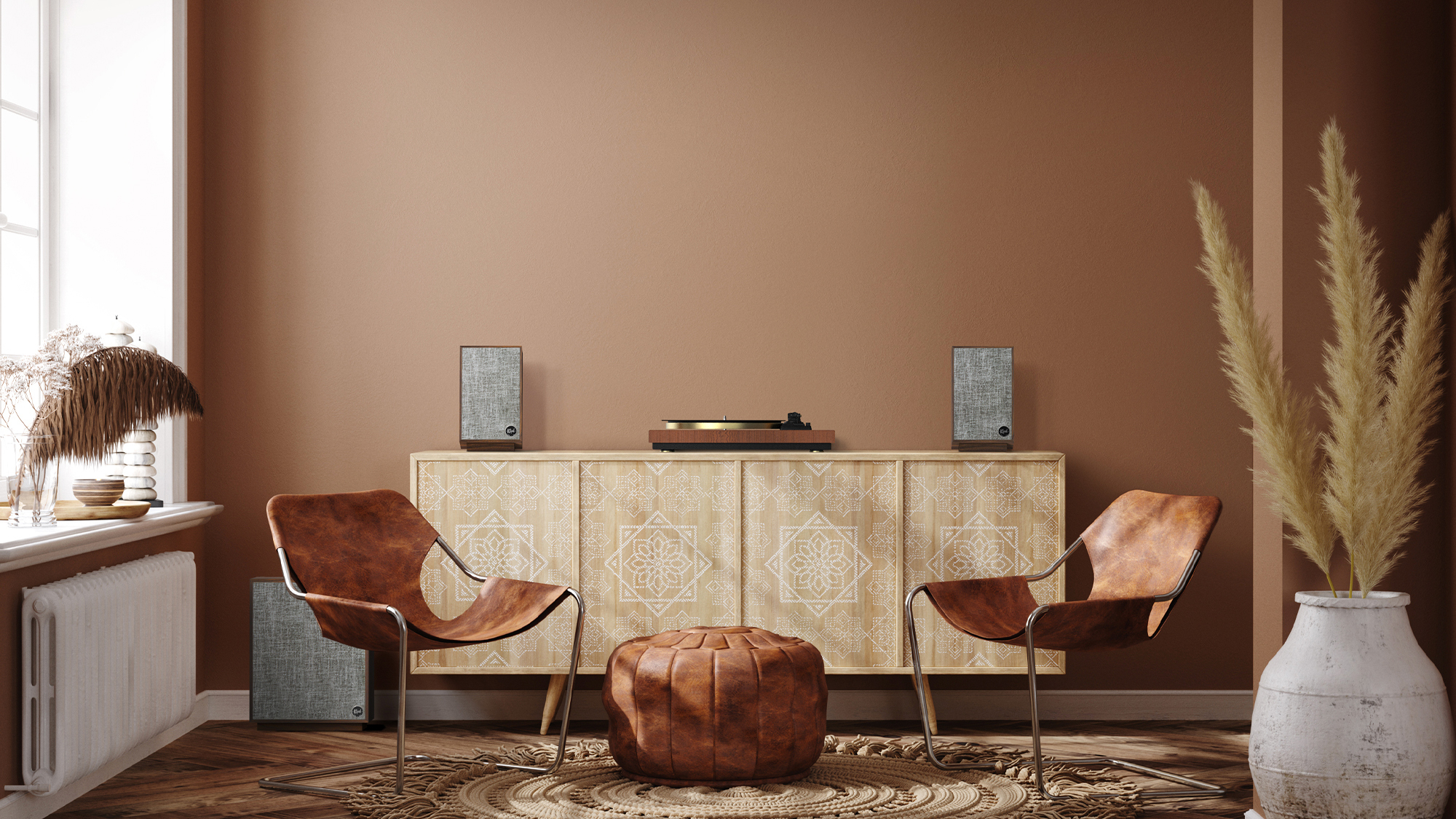 Klipsch Pro Media Heritage 2 1 speakers in a home next to a record player with 2 chairs