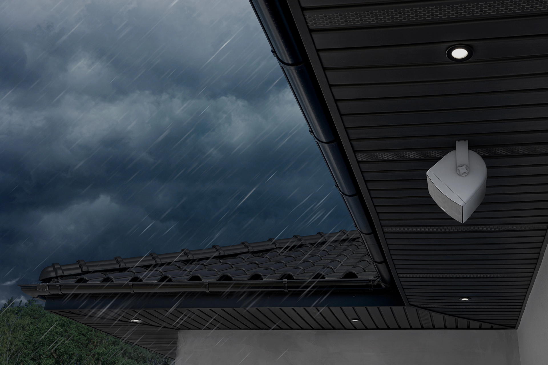 Klipsch RO 525 Outdoor Speaker Under Eaves with Stormy Skies 2000x1333 v01