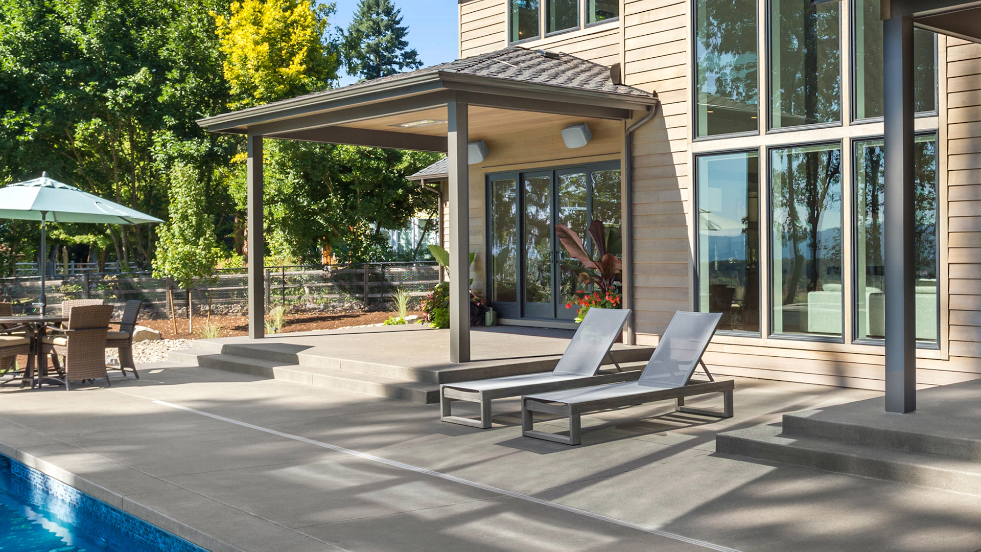 Klipsch RSM 800 in Big Outdoor Living Area with Pool and Dining 2000x2500