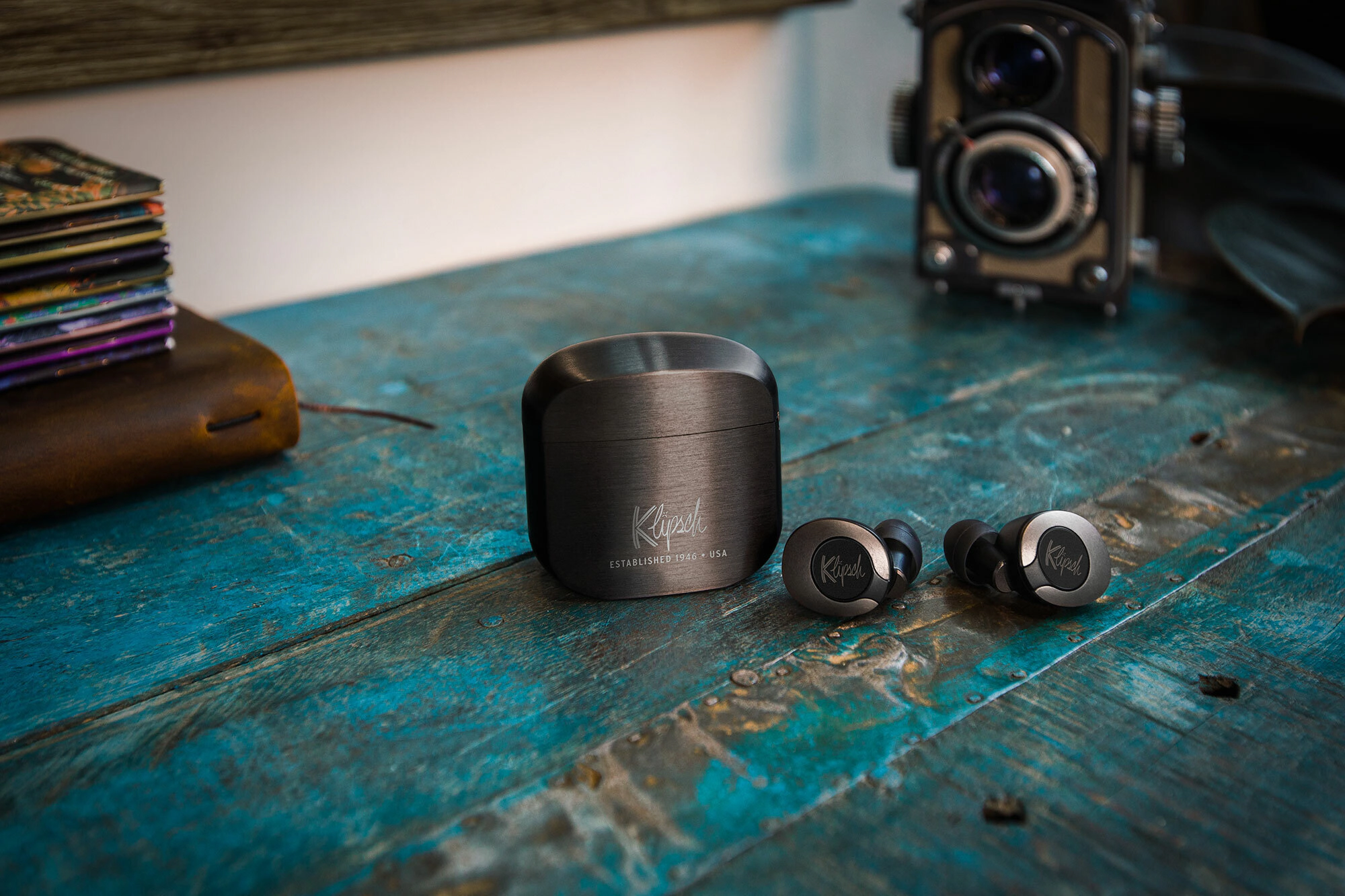Klipsch T5 II true wireless earphones on jade table