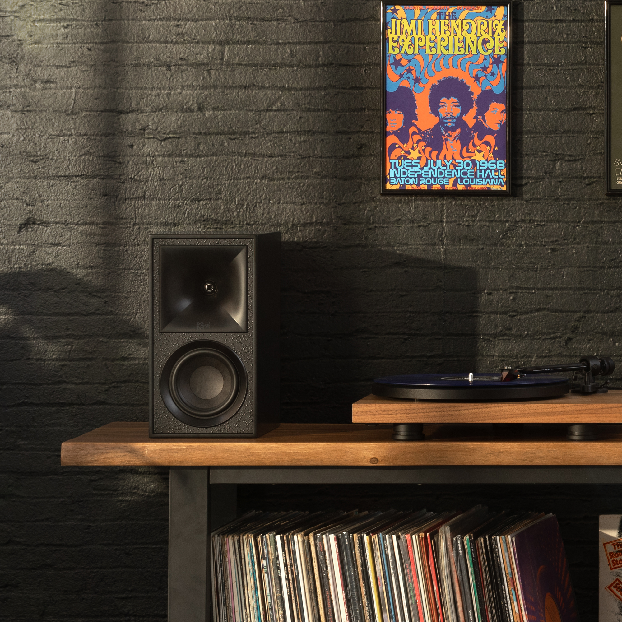 Klipsch The Fives in Black beside record player and vinyl collection with classic music posters 2000x2000