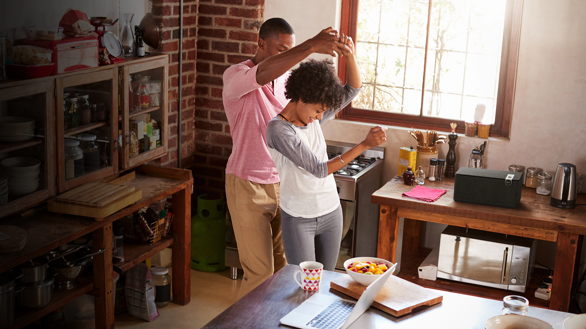 Klipsch The Three Plus with couple dancing in kitchen 1920x1080