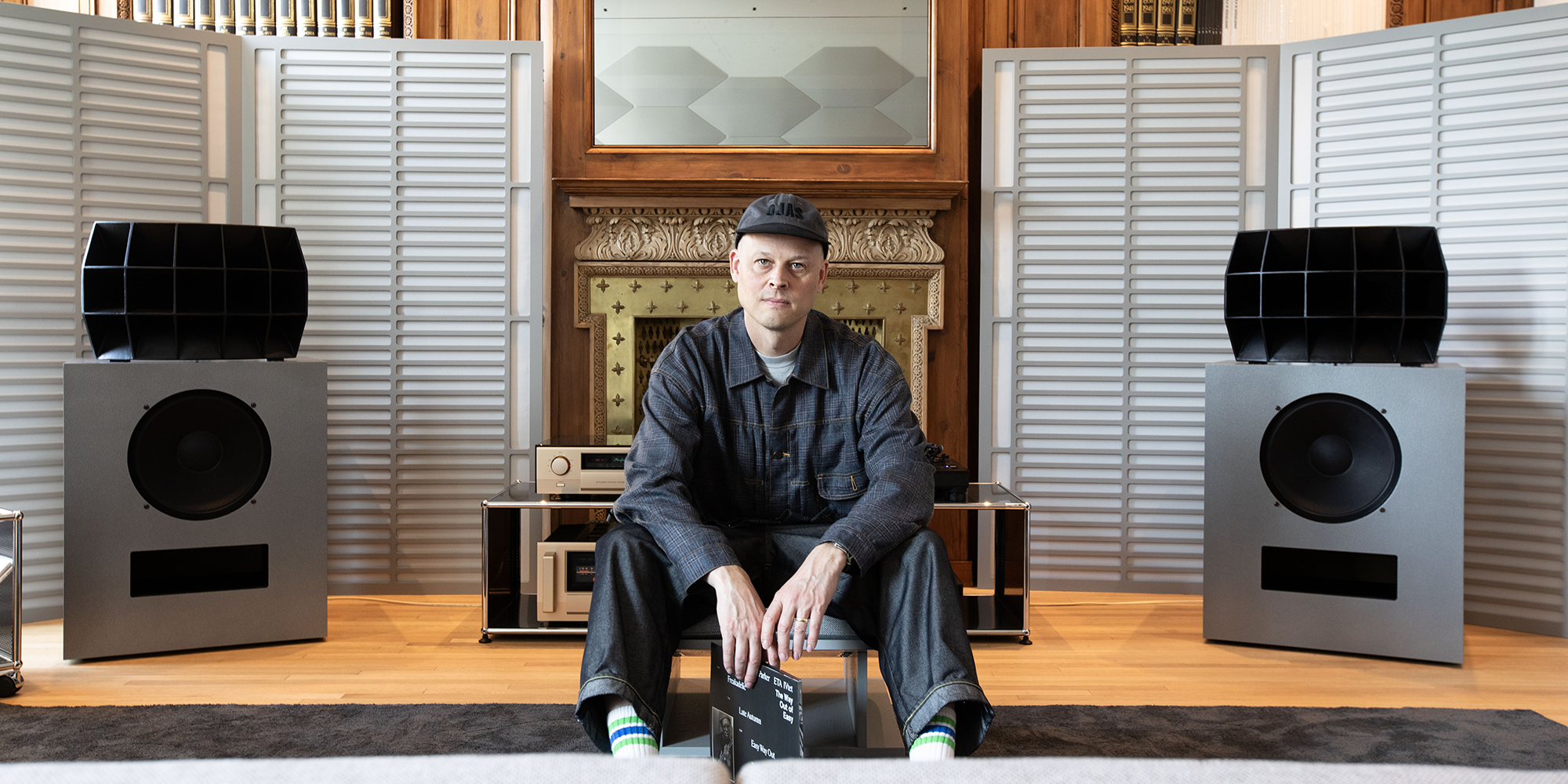 Klipsch x Ojas Devon Turnbull in front of pair of k O R2 in Milan 2000x1000