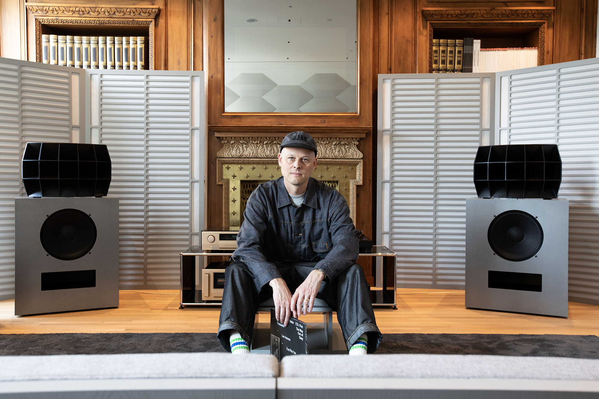 Klipsch x Ojas Devon Turnbull in front of pair of k O R2 in Milan 2000x1333 png