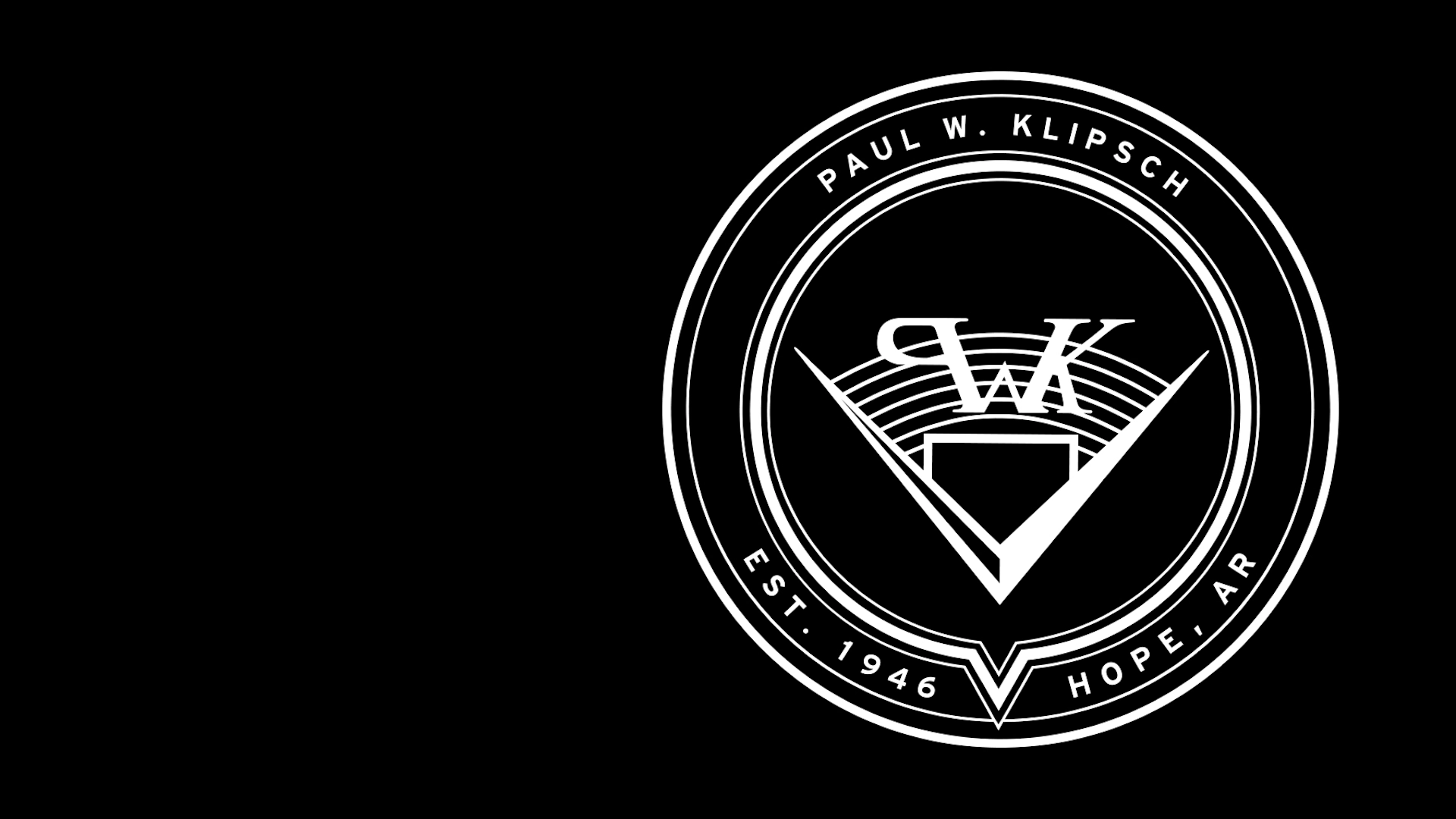 PWK logo on black background