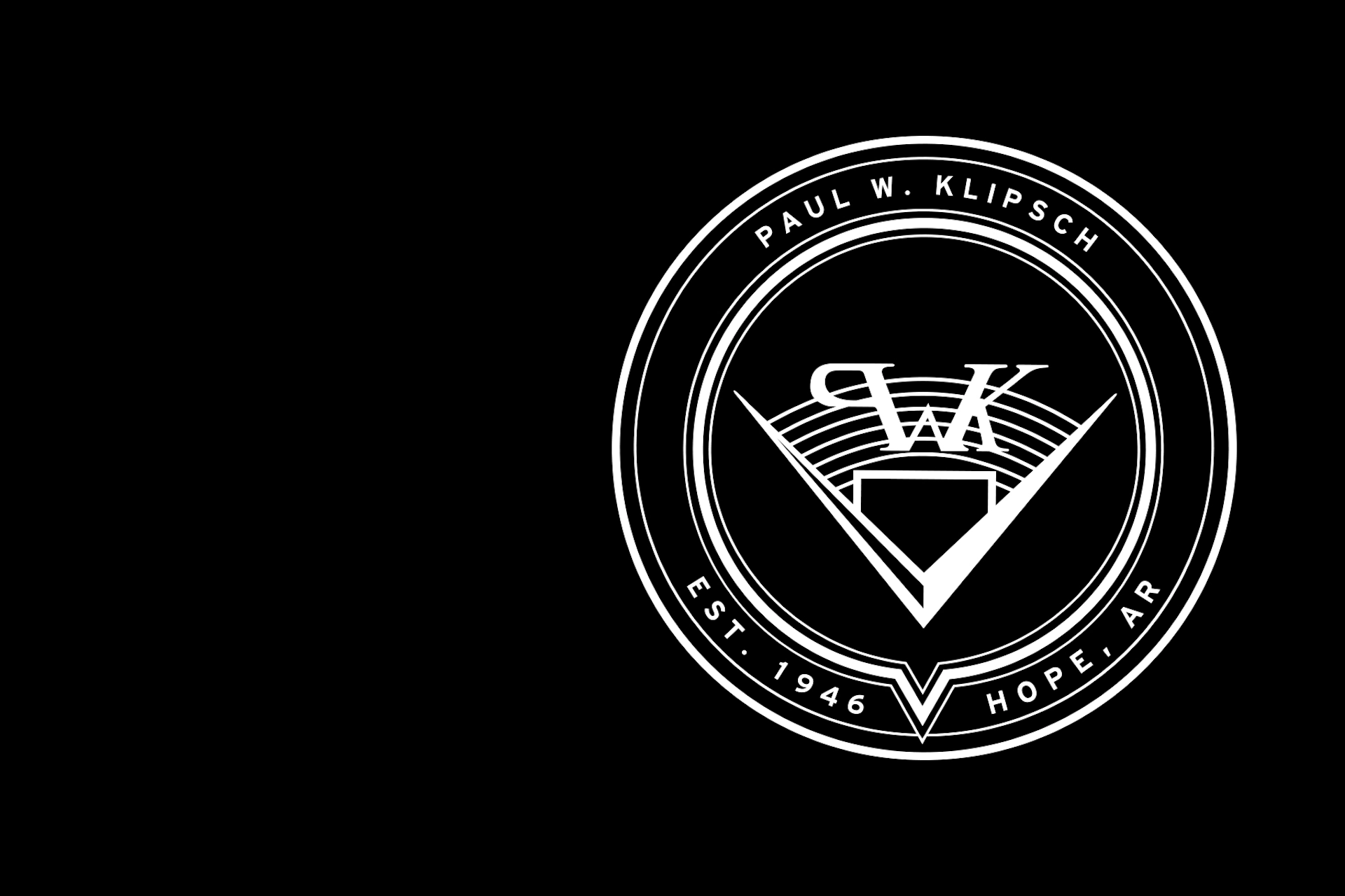 PWK logo on black background