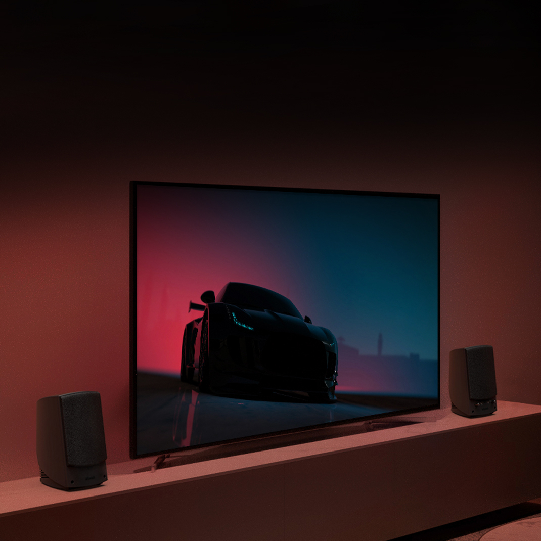 Pro Media 2 0 in a small living room next to a TV mobile