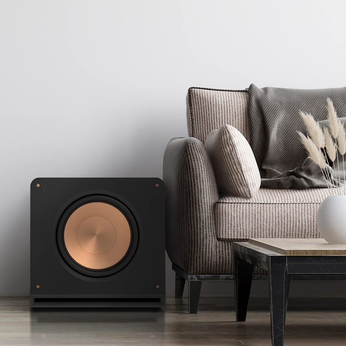 RP 1600 SW on a floor next to a sofa mobile