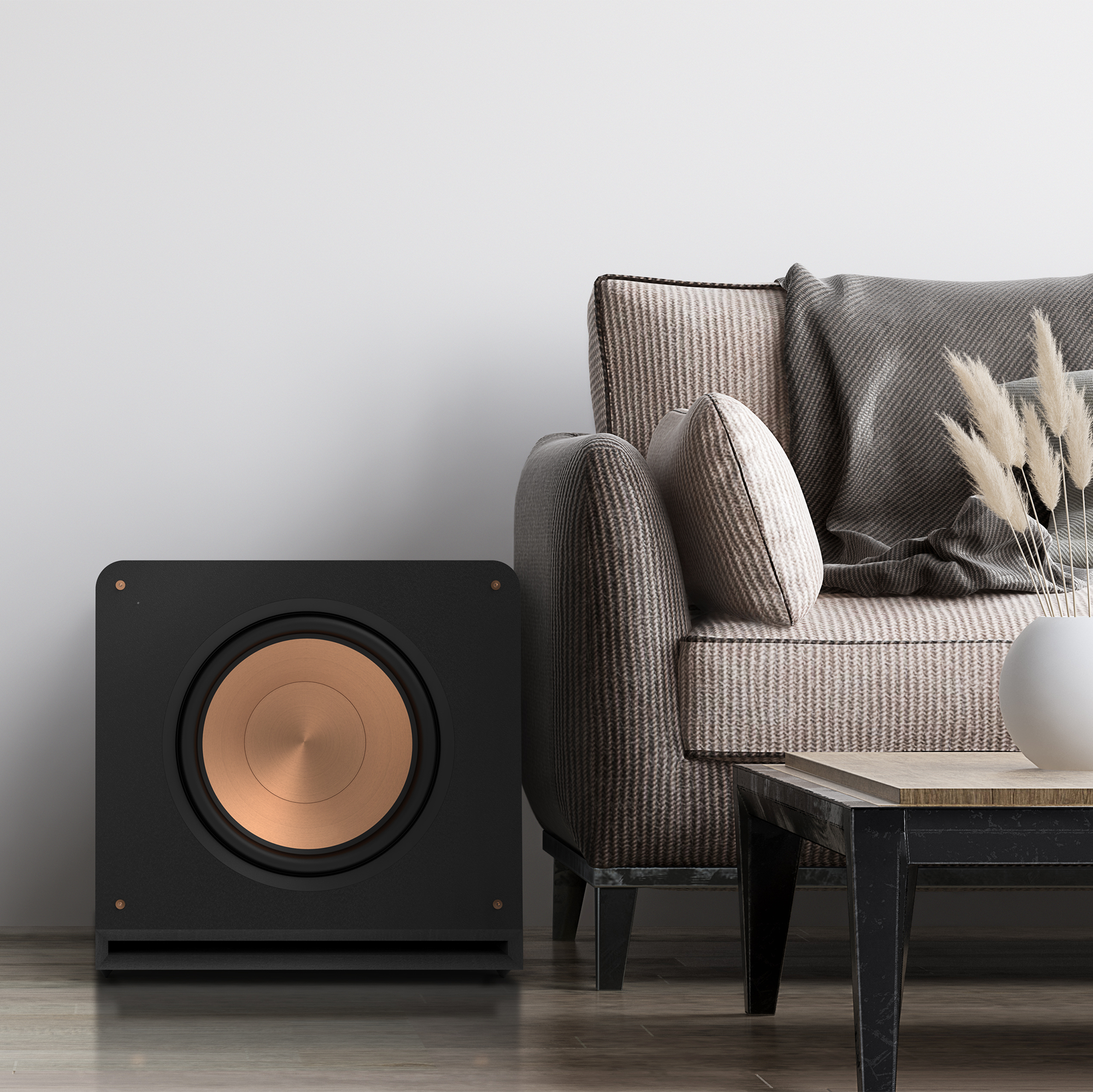 RP 1600 SW on a floor next to a sofa mobile