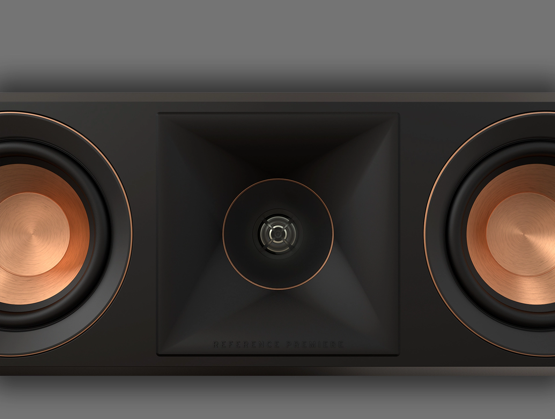 RP 404 C II Close up of horn with copper woofers at the side on a grey background