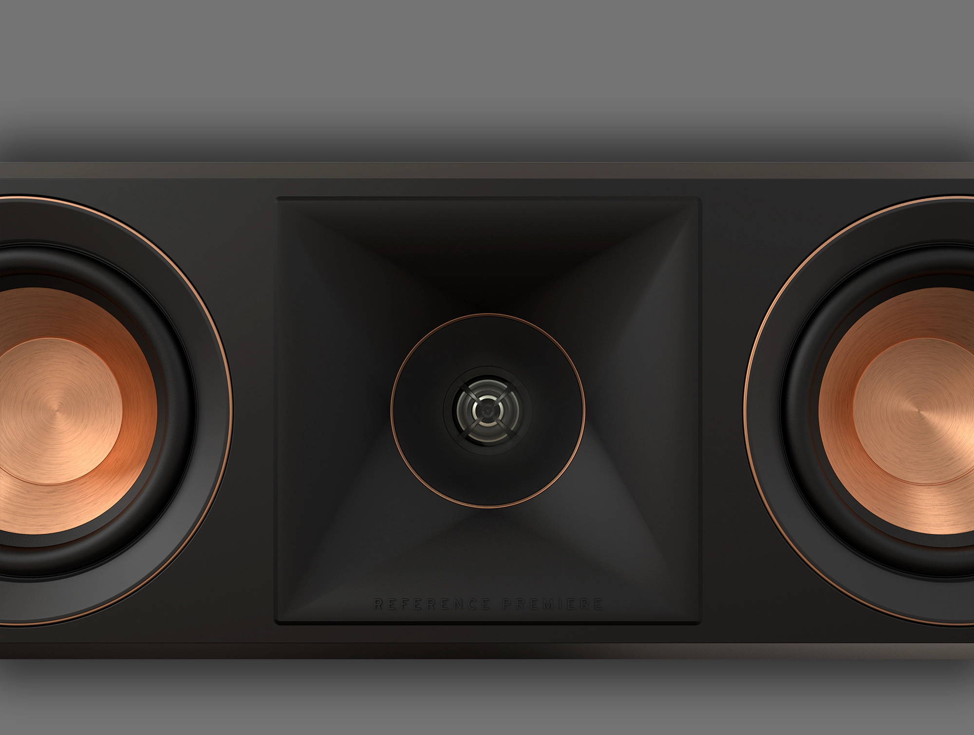 RP 404 C II Close up of horn with copper woofers at the side on a grey background