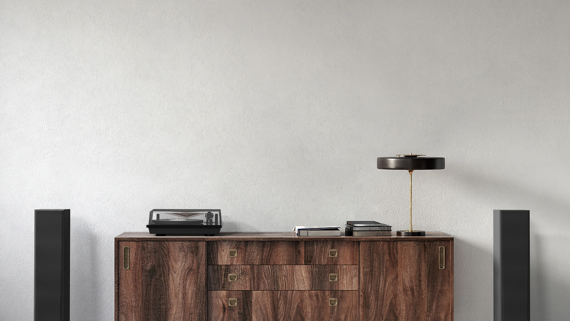 RP 5000 F speakers flanking a nice wooden credenza with a turntable lamp and books on it mobile