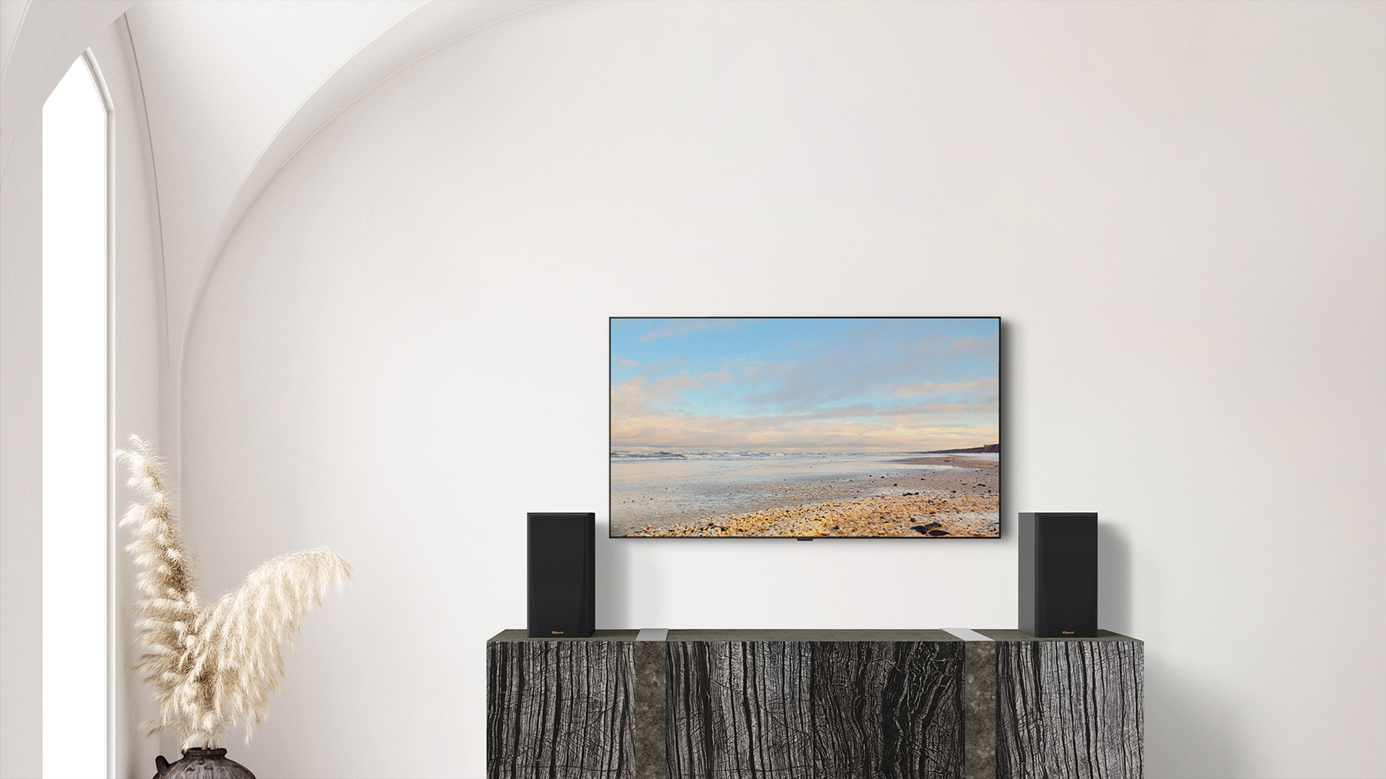 RP 500 M II on a dark grey wooden credenza under a TV