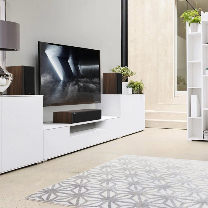RP 504 C II on a white credenza next to RP 600 M II under a TV mobile