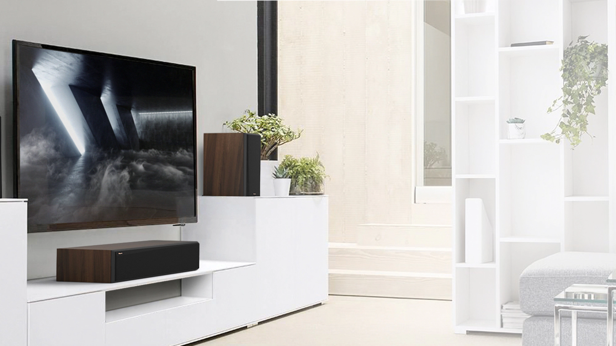 RP 504 C II on a white credenza next to RP 600 M II under a TV