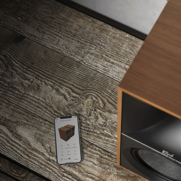 The Nines Walnut Beside Phone Klipsch App Open 2000x2000
