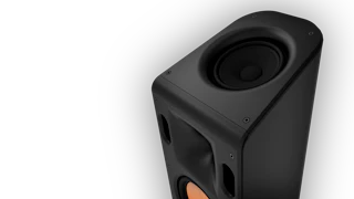 Close-up shot of a Reference Cinema System Satellite Speaker's top portion including upfiring elevation driver