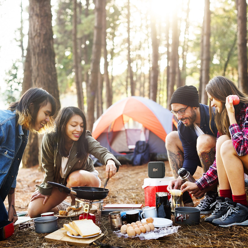 Klipsch Austin near friends cooking over campfire 2000x2000