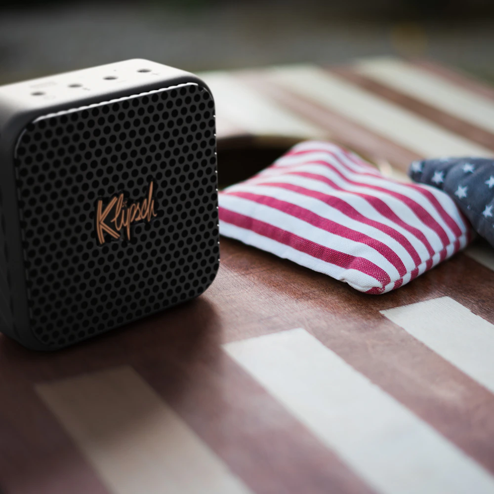 Klipsch Austin on corn hole board 2000x2000