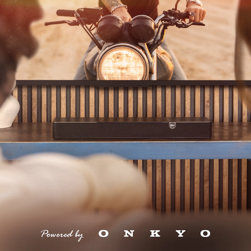 Klipsch Flexus CORE 100 WN with motorcycle on tv with PBO logo 2000x2000