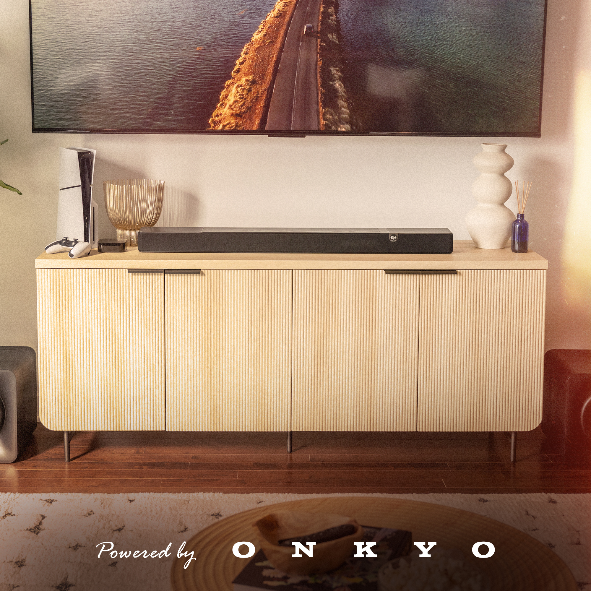 Klipsch Flexus CORE 200 BK on modern media console with PBO logo 2000x2000